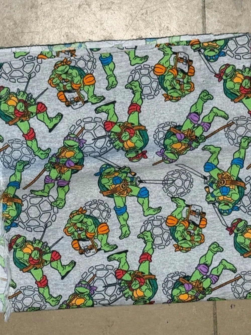 Springs Creative Teenage Mutant Ninja Turtles Retro Toss Cotton Fabric on Gray